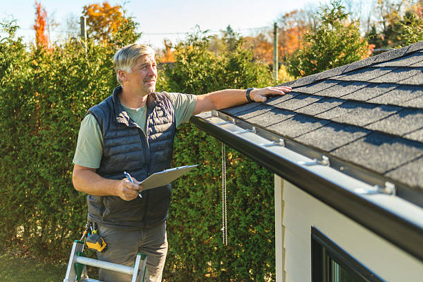 Professional Roof Replacement technician working in Fall River, MA